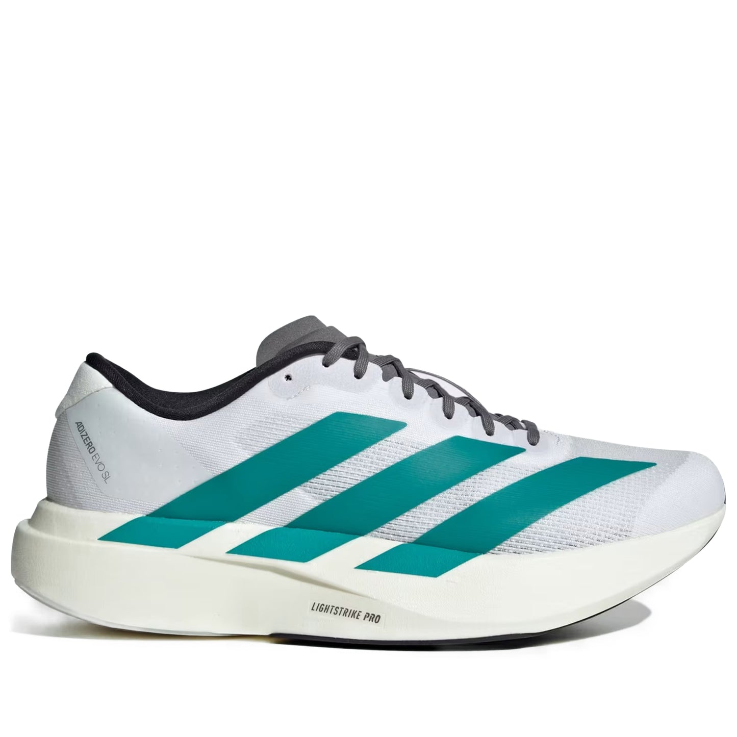 White running shoe with green stripes on a white background