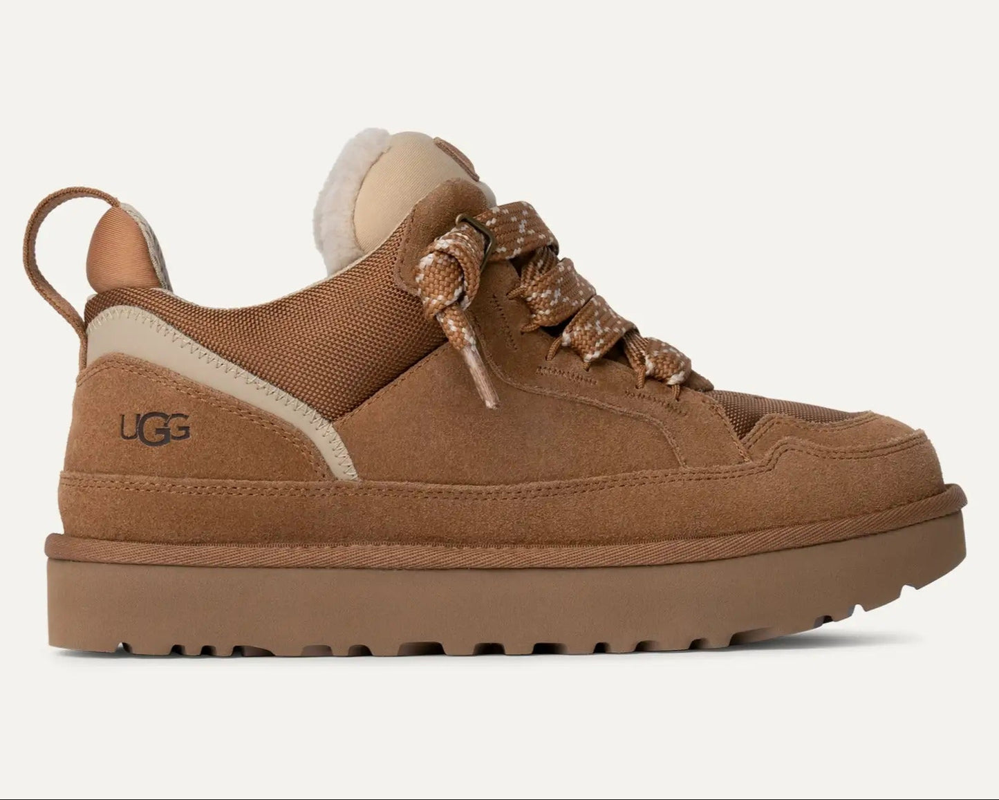 Brown sneaker with UGG logo on a white background