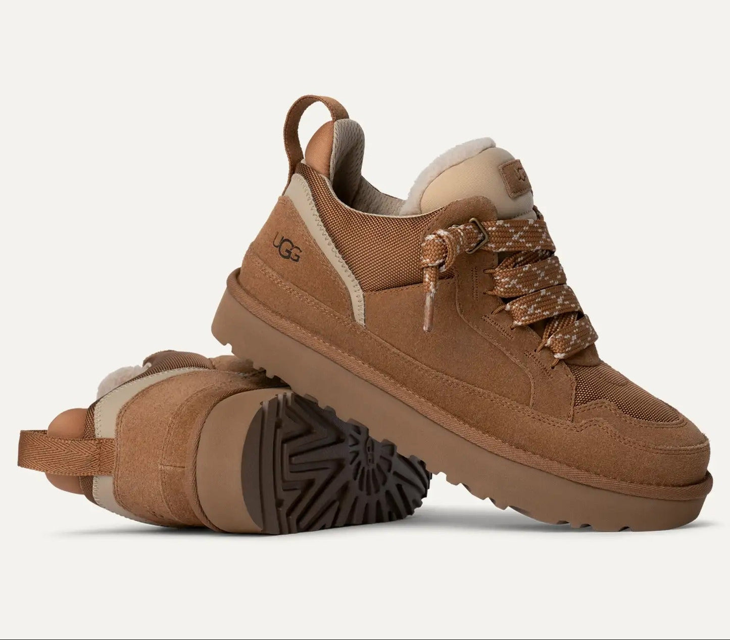 Brown sneakers with a textured pattern on a white background