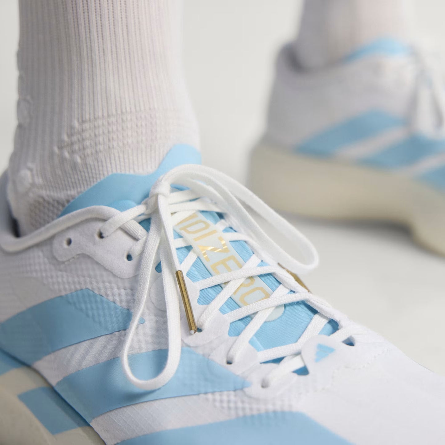Men's Adidas Adizero Evo SL Woven - Cloud White / Clear Blue / Matte Gold