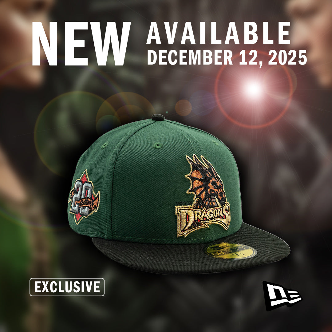 Green baseball cap with dayton dragons logo and 'New Available' text on a blurred background