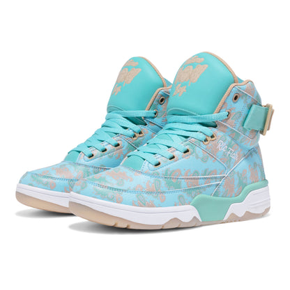 A pair of high-top sneakers in light blue and turquoise with a beige floral pattern, white midsoles, and turquoise accents on the heel and tongue, shown against a plain white background.