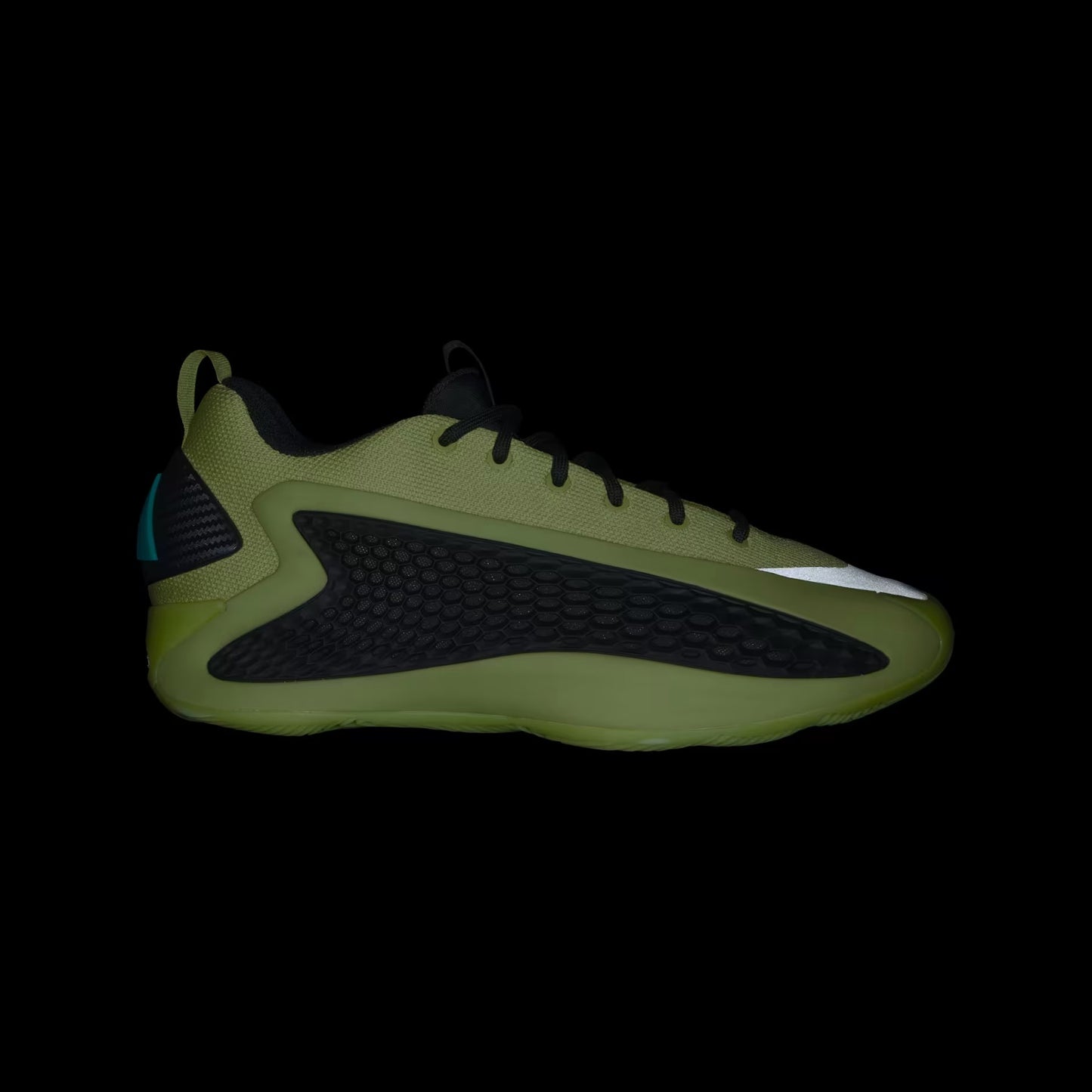 Green sneaker with black sole on a transparent background