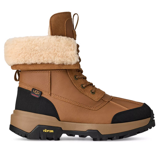 Brown winter boot with shearling lining on a white background