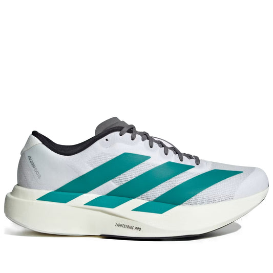 White running shoe with green stripes on a white background