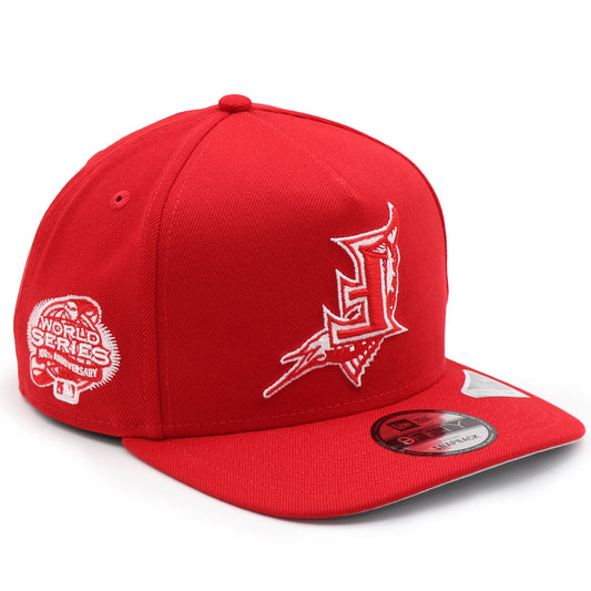 Red baseball cap with white logo on a white background