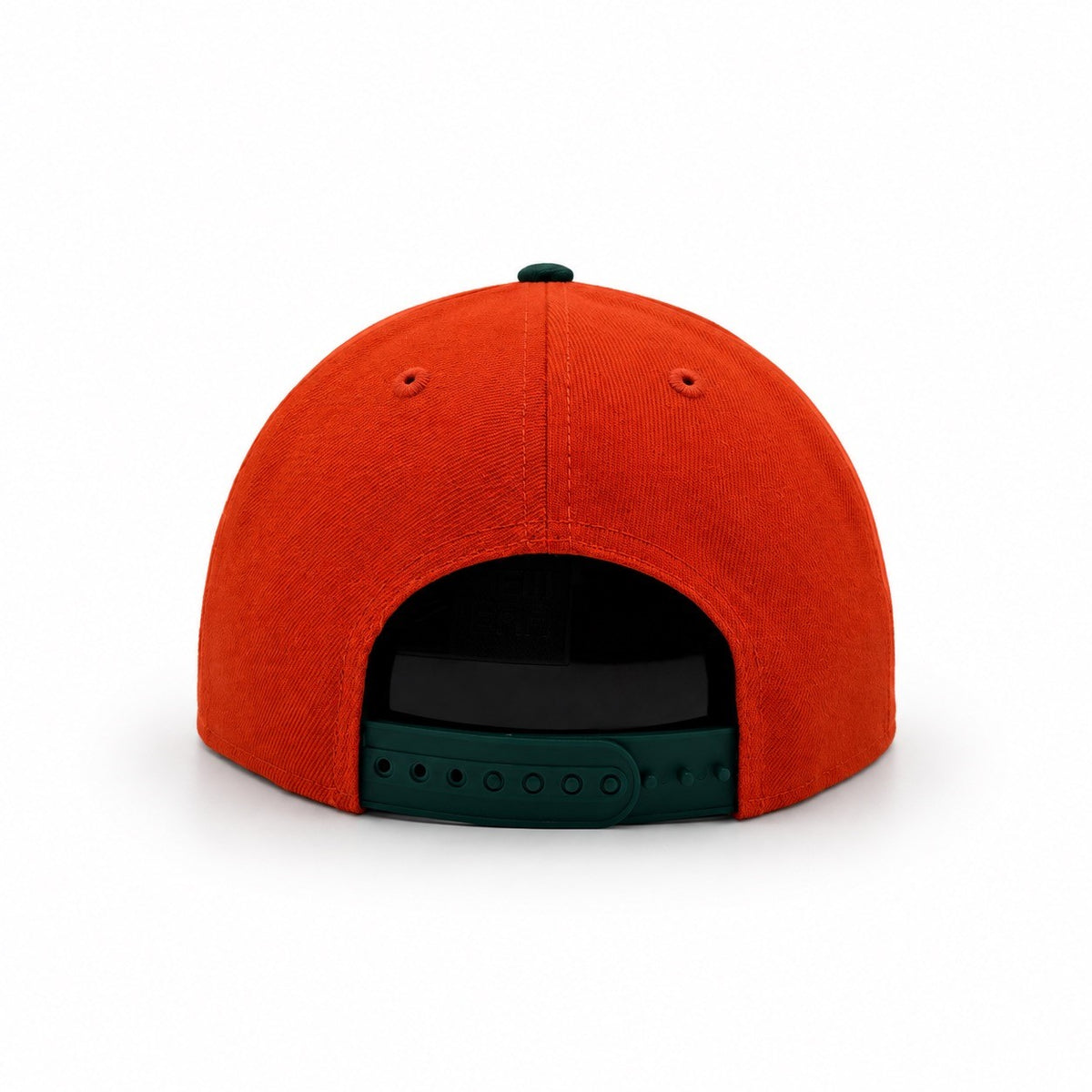 The back view of a bright orange snapback cap with a dark green adjustable strap and a black button on top, shown against a plain white background.