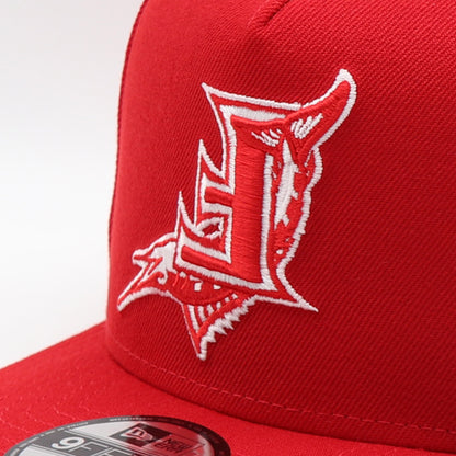 Red cap with a white Florida_Marlins logo fliped upside down on red cap