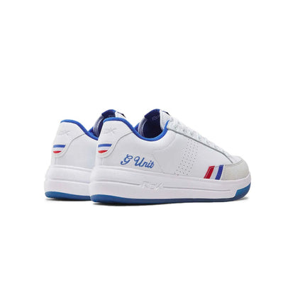 A pair of white low-top sneakers with blue and red accents, featuring 'G.Uni' script on the side and a blue 'Fila' logo on the heel, shown against a plain white background.