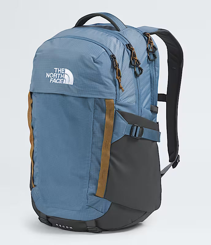 green and blue north face backpack The Women's Borealis Cyber Berry/Sumac The huge main compartment holds all the books and binders needed for a day on campus The North Face Recon Backpack